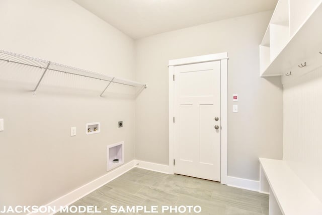 washroom with hookup for a washing machine and electric dryer hookup