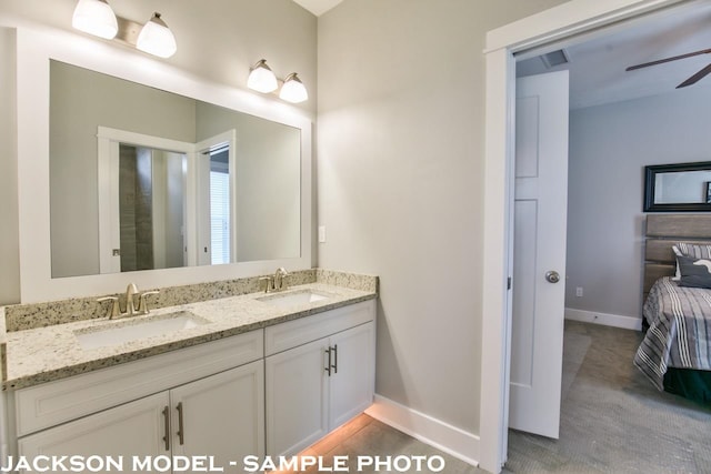 bathroom with vanity and ceiling fan