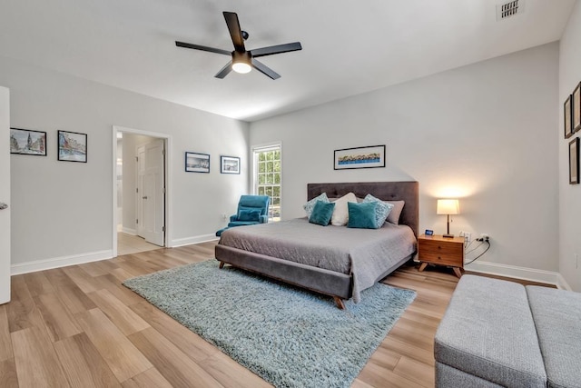 323 Carr Ln, Tallahassee, FL 32312 - bedroom featuring light wood-style floors, baseboards, and a ceiling fan