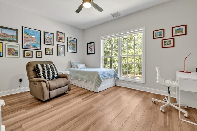 323 Carr Ln, Tallahassee, FL 32312 - bedroom with baseboards, light wood-style flooring, and a ceiling fan