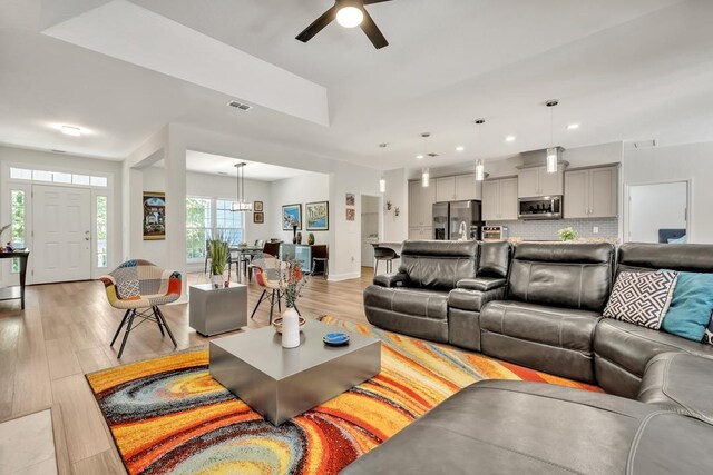323 Carr Ln, Tallahassee, FL 32312 - living area featuring light wood-style floors, ceiling fan, recessed lighting, and baseboards