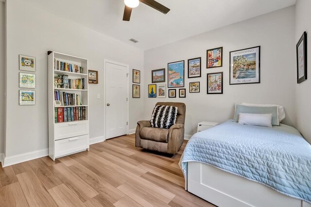 323 Carr Ln, Tallahassee, FL 32312 - bedroom featuring light wood-style flooring, ceiling fan, and baseboards
