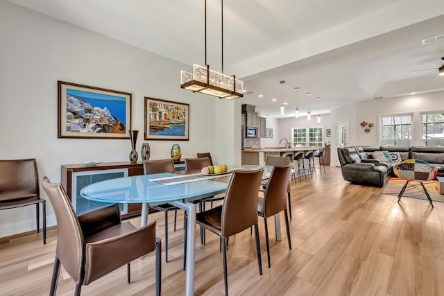323 Carr Ln, Tallahassee, FL 32312 - dining space featuring light wood-style flooring, a ceiling fan, recessed lighting, and baseboards