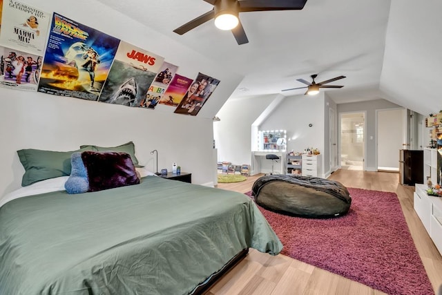 323 Carr Ln, Tallahassee, FL 32312 - bedroom with wood finished floors, vaulted ceiling, and a ceiling fan