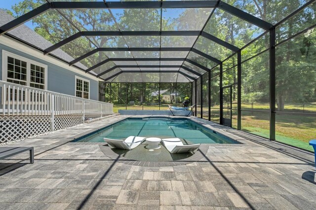 323 Carr Ln, Tallahassee, FL 32312 - swimming pool with a patio and a lanai
