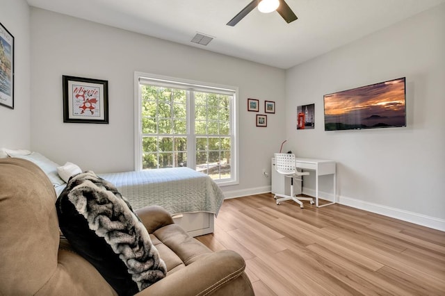 323 Carr Ln, Tallahassee, FL 32312 - bedroom with light wood-style floors, baseboards, and a ceiling fan