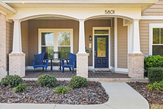 entrance to property with covered porch