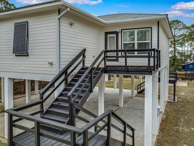 entrance to property featuring a patio area