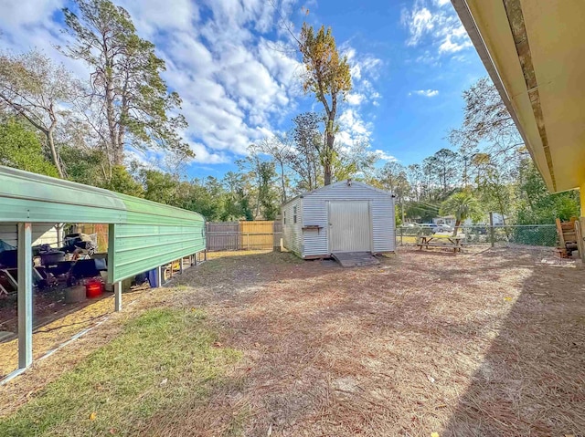 view of yard featuring a storage unit