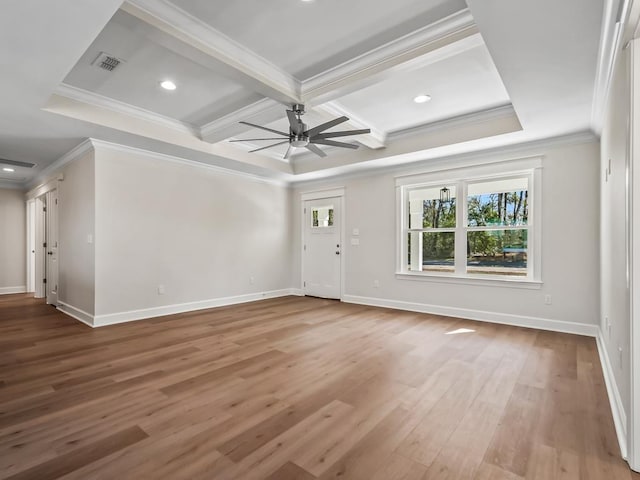 unfurnished living room with ornamental molding, coffered ceiling, hardwood / wood-style floors, and ceiling fan