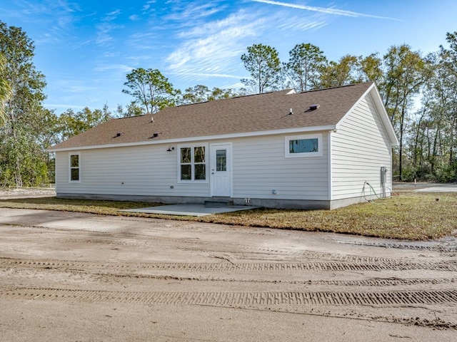 back of property featuring a patio area