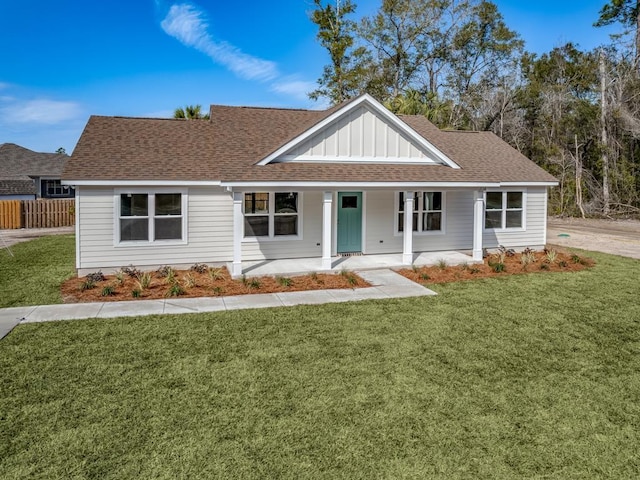 view of front of property with a front lawn and a porch