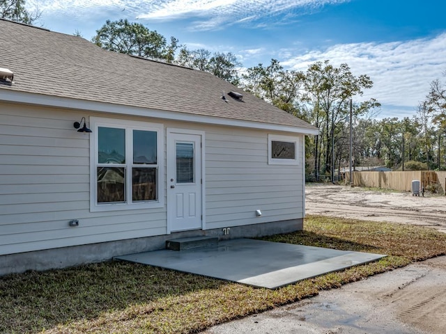 doorway to property with a patio area