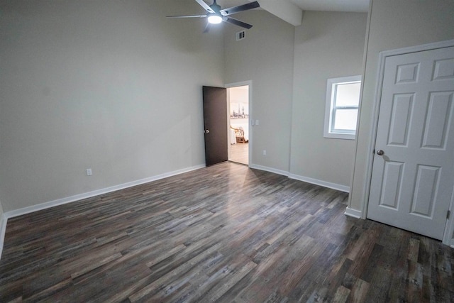 unfurnished bedroom featuring dark hardwood / wood-style floors, high vaulted ceiling, and ceiling fan