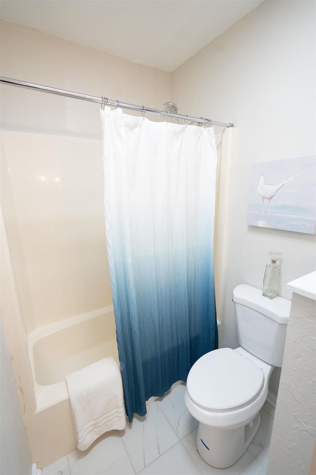 bathroom with shower / bath combination with curtain and toilet