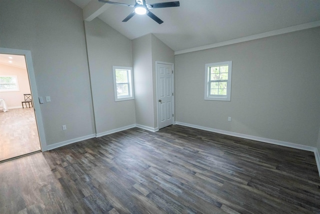 unfurnished bedroom featuring multiple windows, ceiling fan, and lofted ceiling with beams