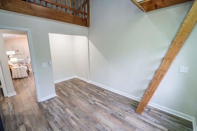 stairs featuring hardwood / wood-style flooring