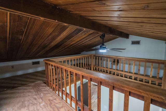 interior space with lofted ceiling with beams and wood ceiling