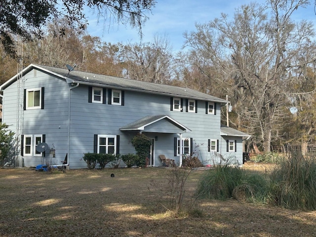 view of front of home with a front yard