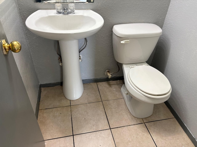 2020 Continental Ave Unit 120, Tallahassee, FL 32304 - bathroom featuring a textured wall and tile patterned floors
