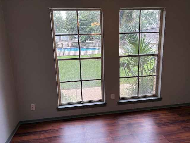 2020 Continental Ave Unit 120, Tallahassee, FL 32304 - doorway with dark wood-type flooring