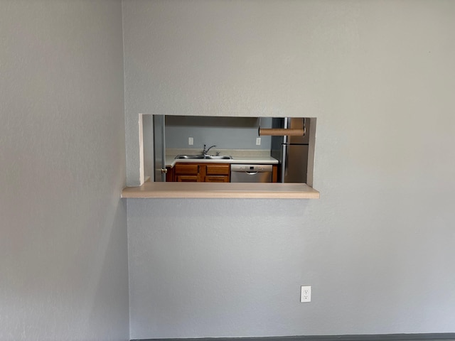 2020 Continental Ave Unit 120, Tallahassee, FL 32304 - detailed view of appliances with stainless steel finishes and a sink