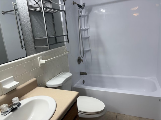 2020 Continental Ave Unit 120, Tallahassee, FL 32304 - bathroom featuring vanity, shower / bath combination, tile patterned flooring, and tile walls