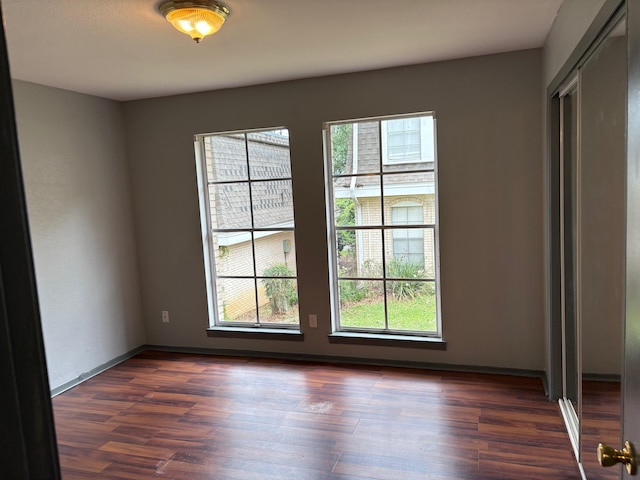 2020 Continental Ave Unit 120, Tallahassee, FL 32304 - spare room with dark wood-type flooring