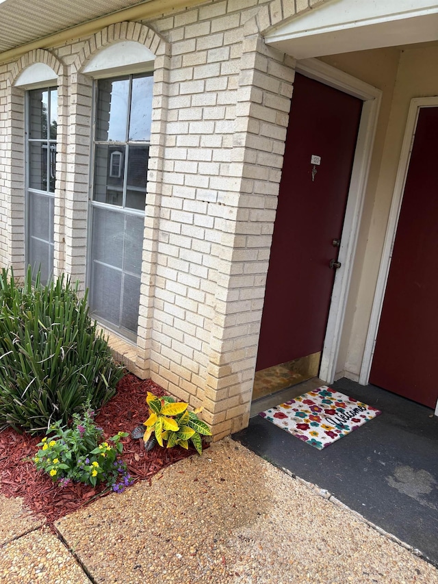 2020 Continental Ave Unit 120, Tallahassee, FL 32304 - doorway to property featuring brick siding
