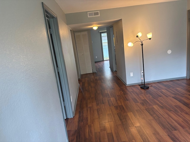2020 Continental Ave Unit 120, Tallahassee, FL 32304 - hallway featuring dark wood-style flooring and baseboards