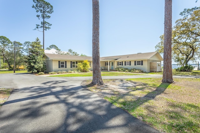 2433 Surf Rd, Panacea, FL 32346 - ranch-style house with curved driveway
