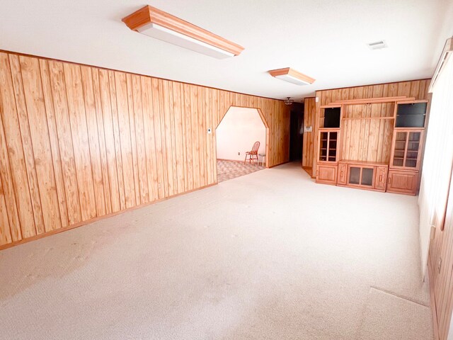 2048 W Gas Plant Rd, Perry, FL 32347 - carpeted empty room featuring wooden walls