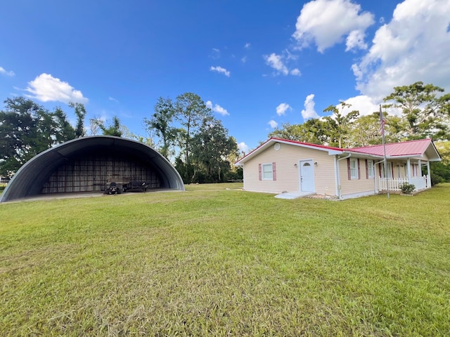 2048 W Gas Plant Rd, Perry, FL 32347 - view of green lawn featuring covered porch and a carport
