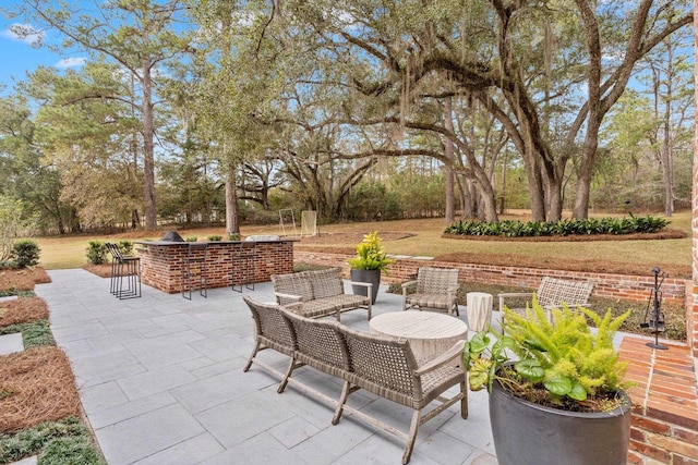 view of patio / terrace with exterior bar