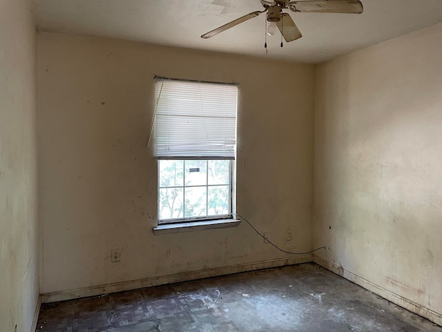 spare room featuring ceiling fan