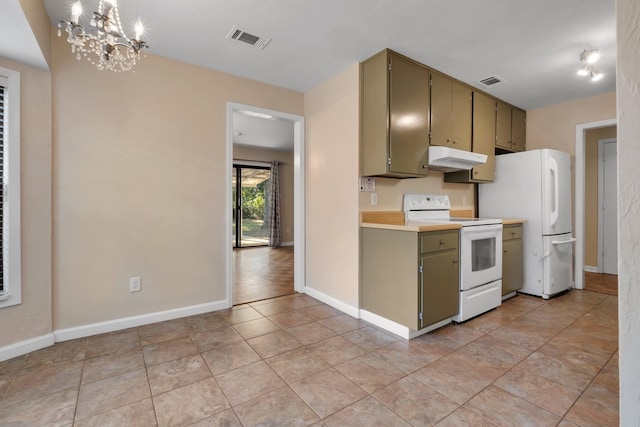 kitchen featuring green cabinets, light tile patterned flooring, white appliances, and an inviting chandelier