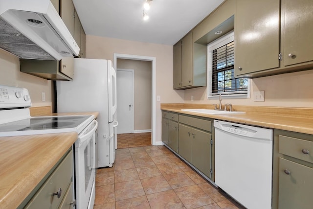 kitchen featuring light tile patterned flooring, white appliances, extractor fan, and sink