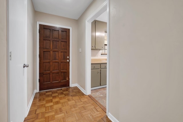 foyer with light parquet flooring