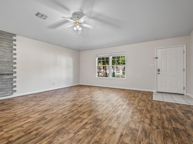 1 Black Foot Rd, Crawfordville, FL 32327 - spare room featuring wood finished floors and a ceiling fan
