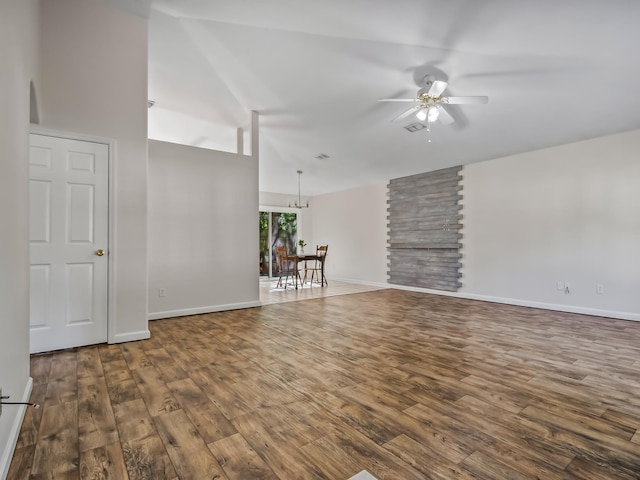 1 Black Foot Rd, Crawfordville, FL 32327 - unfurnished living room featuring wood finished floors, ceiling fan, and high vaulted ceiling
