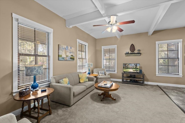 233 NE Maggie Cir, Steinhatchee, FL 32359 - living room featuring beamed ceiling, healthy amount of natural light, baseboards, and a ceiling fan