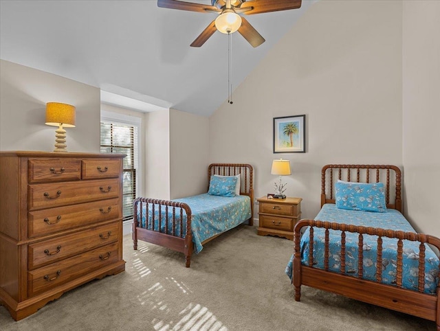 233 NE Maggie Cir, Steinhatchee, FL 32359 - bedroom featuring light carpet, vaulted ceiling, and a ceiling fan