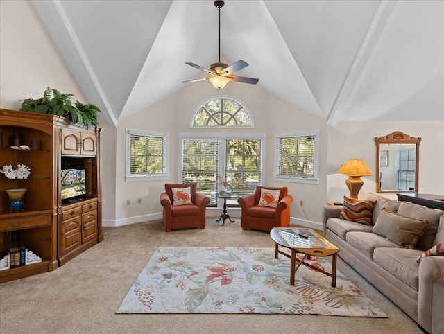 233 NE Maggie Cir, Steinhatchee, FL 32359 - living area featuring light colored carpet, ceiling fan, baseboards, and vaulted ceiling