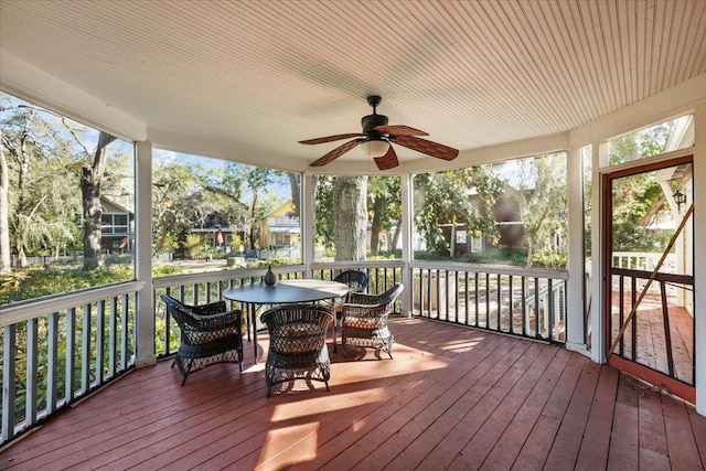 233 NE Maggie Cir, Steinhatchee, FL 32359 - wooden terrace featuring a ceiling fan and outdoor dining space