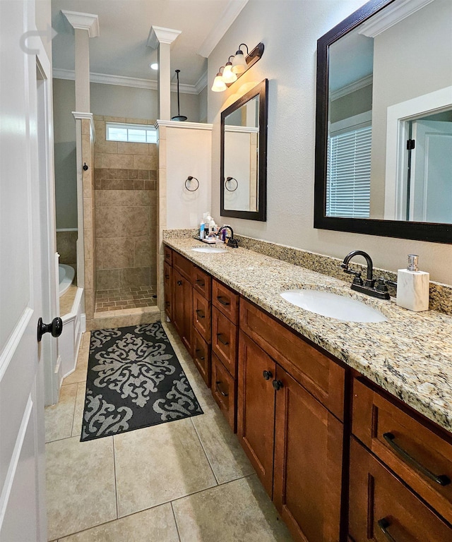 bathroom with shower with separate bathtub, ornamental molding, tile patterned floors, and vanity