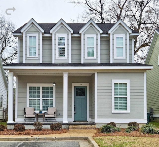 view of front of home featuring covered porch