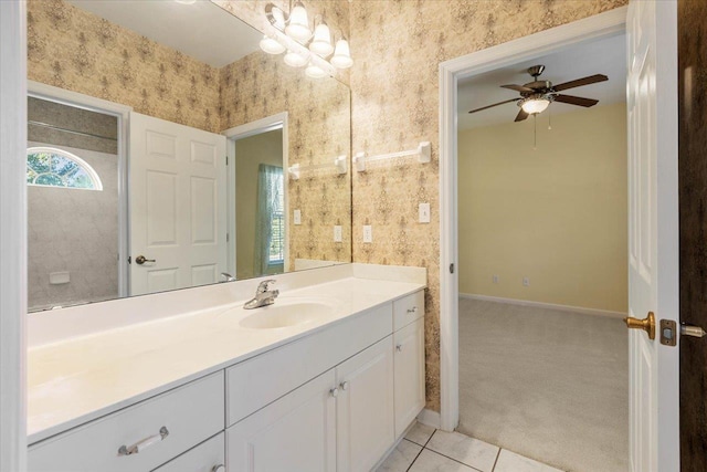 bathroom with ceiling fan, vanity, and tile patterned floors