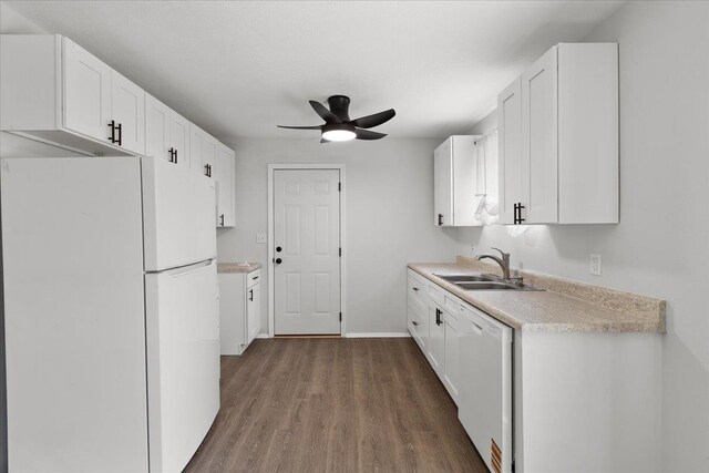 603 W Ash St, Perry, FL 32347 - kitchen featuring white appliances, a sink, a ceiling fan, light countertops, and dark wood-style floors
