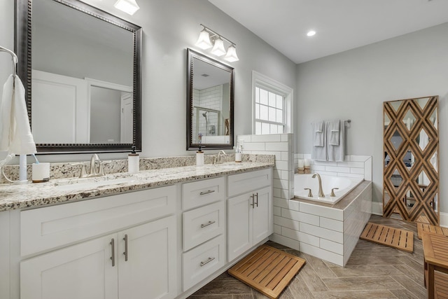 3325 Mariana Oaks Dr, Tallahassee, FL 32311 - bathroom with double vanity, a bath, a tile shower, and recessed lighting