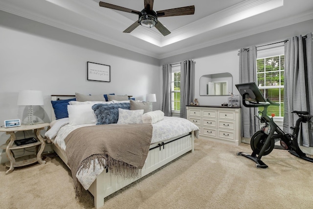 3325 Mariana Oaks Dr, Tallahassee, FL 32311 - bedroom featuring light colored carpet, ornamental molding, a raised ceiling, and a ceiling fan